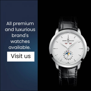 Close-up of a silver Grand Perregaux watch with a black leather strap, displayed with promotional text.