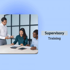 Three business professionals discussing documents around a table during a supervisory training session.