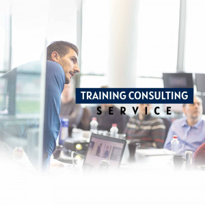 A man presenting to a group in a business training session.