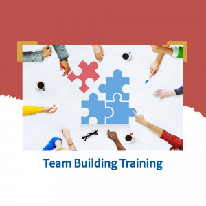 People working together on a jigsaw puzzle during a team building exercise.