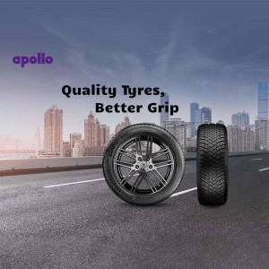 Apollo tyres with a city skyline background