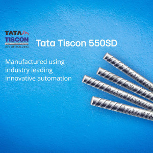 Close-up of Tata Tiscon 550SD steel rebars against a blue background with the Tata logo.