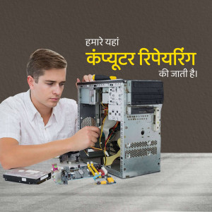 A young man repairing a computer.