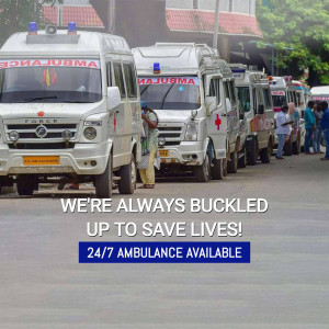 Line of white ambulances with red and blue lights, promoting 24/7 ambulance service.