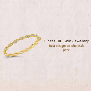 Close-up of a delicate 916 gold bangle with diamond accents.