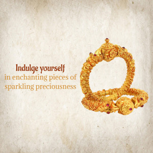Close-up of a detailed gold bangle with ruby accents, advertising jewelry.