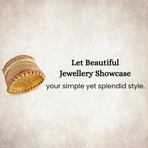 Close-up of a gold bangle with intricate detailing