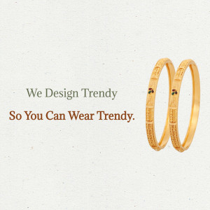 Pair of gold bangles with intricate designs on a beige background