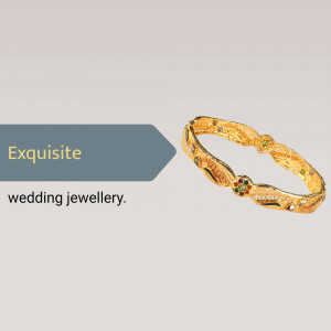 Gold wedding bangle with colorful gemstones