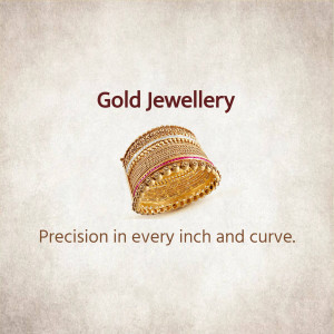 Close-up of a gold bangle with intricate detailing