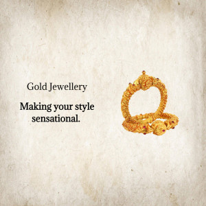 Close-up of ornate gold bangles with red gemstone accents on a textured background.