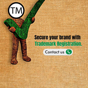 Image depicting a wooden figure with a green checkmark symbolizing trademark registration and brand security.