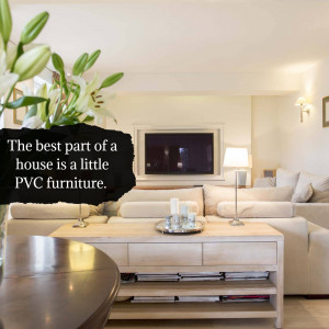 A bright and inviting living room featuring a light-colored sofa, coffee table, and a TV, with a vase of lilies in the foreground and text overlay.