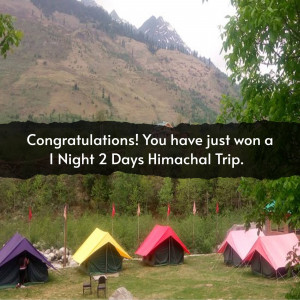 Camping tents in the mountains with a congratulatory message