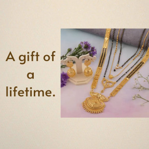 Close-up of a gold necklace and earring set with a floral background.