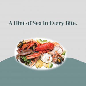 A beautifully arranged seafood platter with lobster, crab, mussels, and other shellfish.