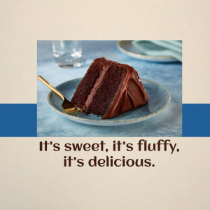 A slice of rich chocolate cake on a blue plate with a gold fork.