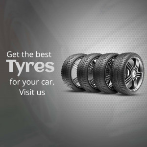 Stack of car tyres with promotional text