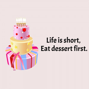 A colorful birthday cake with lit candles and a gift, accompanied by the text 'Life is short, Eat dessert first.'
