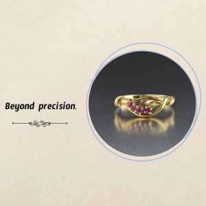 Close-up of a gold ring with three ruby gemstones