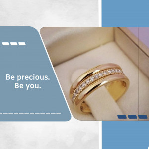 Close-up of a gold and rose gold ring with diamonds in an open jewelry box.