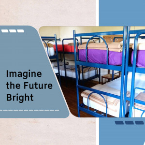 A dormitory room with multiple bunk beds, clean linens, and a motivational message.
