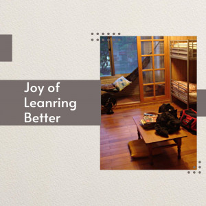 A cozy room with a bunk bed, desk, and study materials.