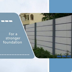 Gray concrete fence with a building in the background and text 'For a stronger foundation'