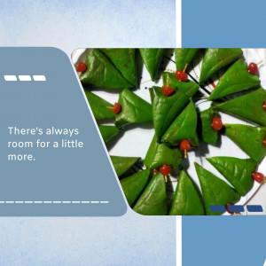 A top-down view of paan (betel leaf) bites arranged in a circular pattern, each topped with a cherry.
