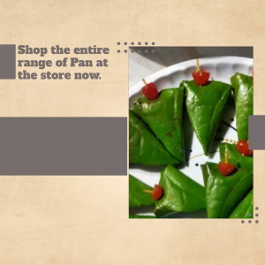 Close-up of green Pan (betel leaf) bites with cherry toppings on a white plate.