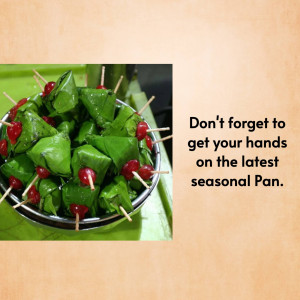 Close-up of a silver bowl filled with betel leaves (pan) garnished with cherries and toothpicks, with text promoting seasonal pan.