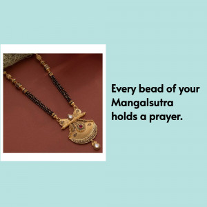 Close-up of a gold and black Mangalsutra necklace with a pearl and ruby pendant.
