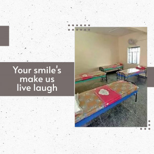 A room with beds in a charitable healthcare facility with text overlay.