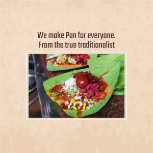 Close-up of a traditional Indian Pan (betel leaf preparation) with colorful toppings.