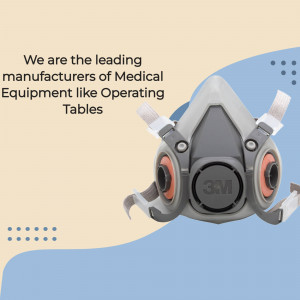 Gray respirator mask with 3M logo on a blue and beige background