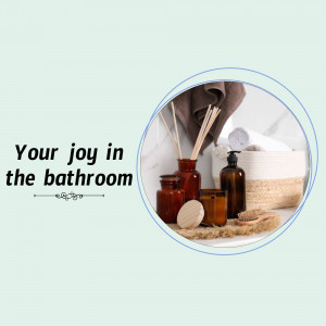 Bathroom decor with reed diffusers, candles, and rolled towels