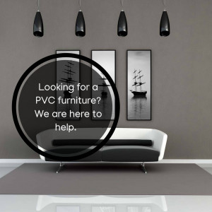 Living room interior with a white sofa, black artwork, and hanging lights, featuring an advertisement for PVC furniture.