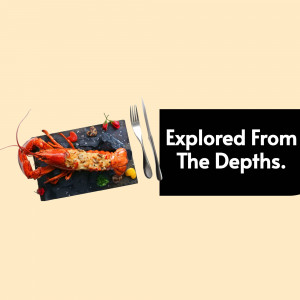 A beautifully plated lobster dish on a slate board with cutlery.