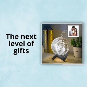 Photo crystal gift with a couple's image inside, displayed on a shelf