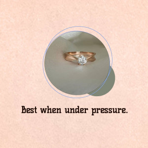 Close-up of a rose gold engagement ring with a solitaire diamond