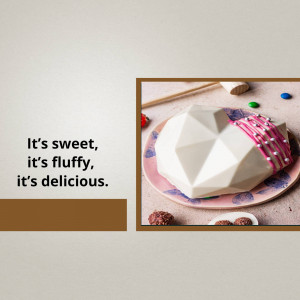 A white chocolate dome shaped like a heart, decorated with pink ribbon and pearls, on a pink plate.