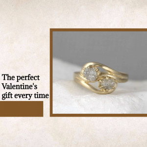 Close-up of a gold ring with two diamond stones