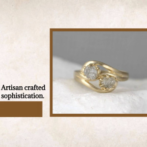 Close-up of a gold ring with two raw diamond stones