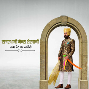 A man wearing a traditional Rajasthani Sherwani standing under an ornate archway.