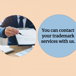 A person holding a clipboard and pen with text promoting trademark services.