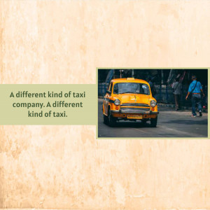 A classic yellow taxi on a city street in India.