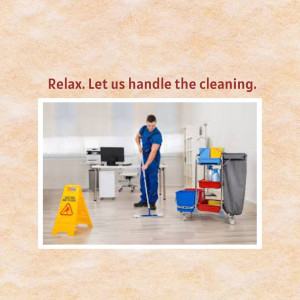 A cleaner mopping the floor in an office setting.
