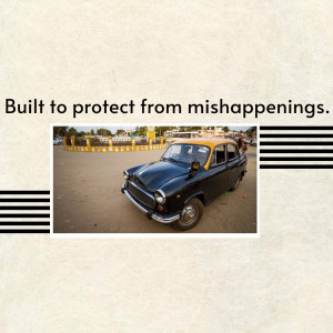 A classic black and yellow Ambassador taxi parked on a road in Kolkata, India.