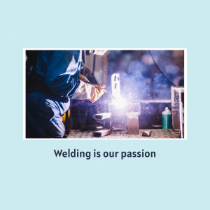 A welder working on a metal structure with sparks flying.