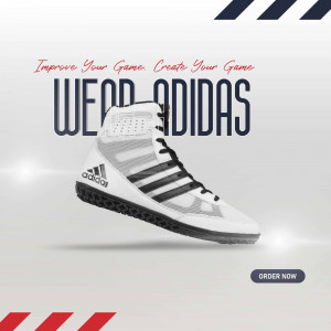 Close-up of Adidas wrestling shoes with promotional text.